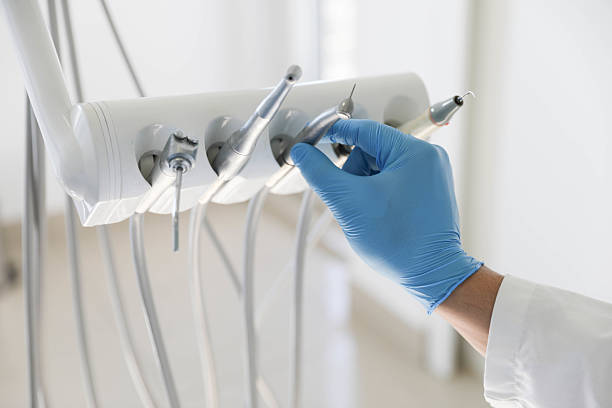 Professional Tooth Extraction technician working in Notre Dame, IN